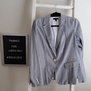 Pinstripe Blazer. Tailored front vents.